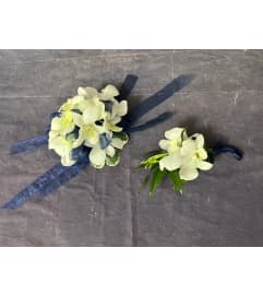 Dendrobium Orchid Wrist Corsage (equivalent Boutonniere sold sepa. An arrangement by Sweet Blossoms.