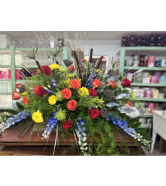 Gone Fishin' in the Skies Casket Spray. An arrangement by Jenilyn's Creations.