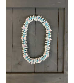 ribbon lei #04. An arrangement by Royal Louis Florist.