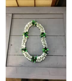 ribbon lei #33. An arrangement by Royal Louis Florist.