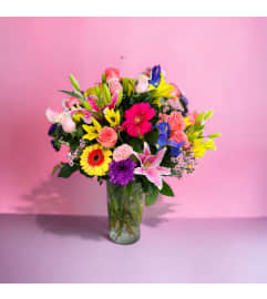 Vibrant Sunshine. An arrangement by Flower World and Gifts.