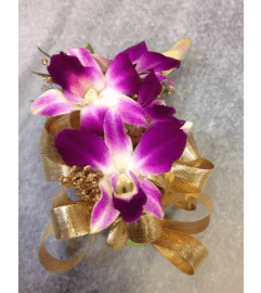 Dendrobium Orchid Corsage. An arrangement by Garden Florist.