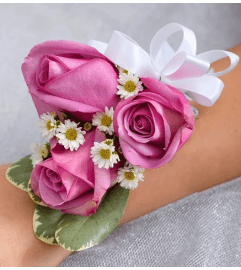 Lavender Elegance Corsage. An arrangement by Garden Florist.