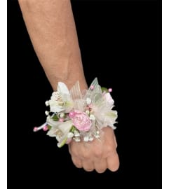 Pretty In Pink Wrist Corsage. An arrangement by In Bloom.