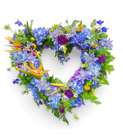 Celestial Tribute Open Heart Wreath. An arrangement by Appleblossoms.