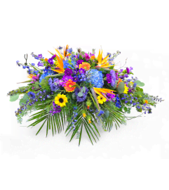 Celestial Tribute Casket Spray. An arrangement by Appleblossoms.