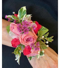 Pretty in Pink Wrist corsage. An arrangement by Loyalist Flowers.