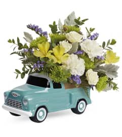 Chevy's Trucking Blossoms Bouquet. An arrangement by North Liberty Flower Shop.