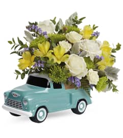 Chevy's Trucking Blossoms Bouquet. An arrangement by North Liberty Flower Shop.