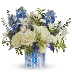Teleflora's Spreading Light Bouquet. An arrangement by Sueppel's Flowers.