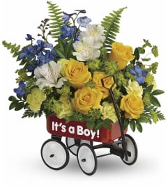 Sweet Little Wagon. An arrangement by Fendley Florists.