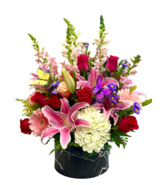 Blooming Bliss. An arrangement by Flower World and Gifts.
