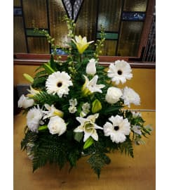White Lily Basket. An arrangement by Sun Valley Florist. White Lily Basket. An arrangement by Sun Valley Florist.