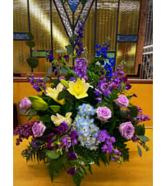 Mixed Purple Funeral Basket. An arrangement by Sun Valley Florist. Mixed Purple Funeral Basket. An arrangement by Sun Valley Florist.