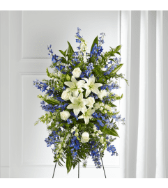 Faithful Friend Standing Spray. An arrangement by Grande Prairie Florist.