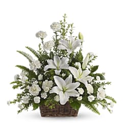 Peaceful White Lilies Basket. An arrangement by Love Floral.