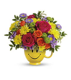 Teleflora's Choose Happy Bouquet. An arrangement by Love Floral.