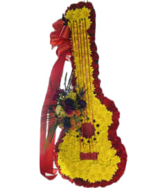 Floral Guitar Tribute. An arrangement by Floral Lady Design Studio LLC.