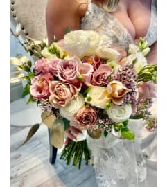 Pink and white bridal bouquet. An arrangement by Floral Lady Design Studio LLC.
