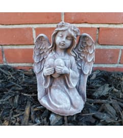 Heart Angel. An arrangement by North Liberty Flower Shop.