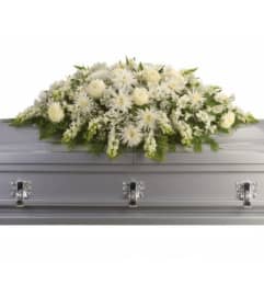 Enduring Light Casket Spray. An arrangement by Flowerdale by Patty.