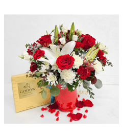 Love Expressions with Chocolates. An arrangement by Brickell Exclusive Blooms.