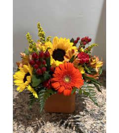 Sunny splendor. An arrangement by Zaisers Florist and Greenhouse.