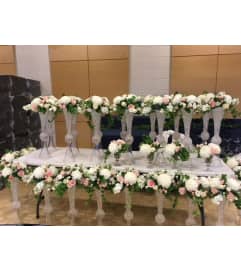 The wedding reception package. An arrangement by Floral Classics.