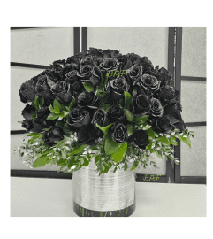 Unique Black Roses. An arrangement by Aventura Blooming Petals.