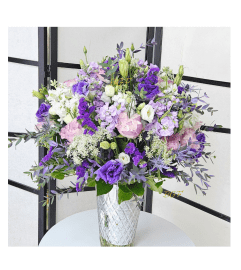 Lavender and White Extravaganza. An arrangement by Aventura Glamour Flowers. Lavender and White Extravaganza. An arrangement by Aventura Glamour Flowers.