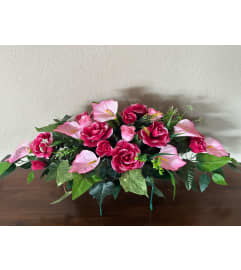 Pink Tombstone Saddle. An arrangement by Loyalist Flowers.