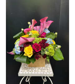 Marivel's Vivid Enchantment. An arrangement by Marivel's Florist and Gifts.