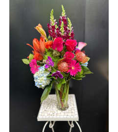 Marivel's Tropical Cascade. An arrangement by Marivel's Florist and Gifts.
