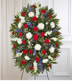 Garden Spray- Red, White And Blue. An arrangement by Garden Florist.
