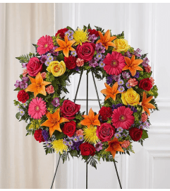 Standing Wreath, Bright Colors. An arrangement by Garden Florist.