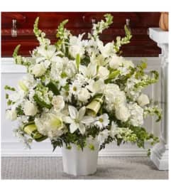 Thoughts and Prayers Floor Basket. An arrangement by Geni's Florist and Gifts.