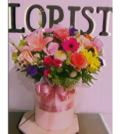 Happy Birthday box. An arrangement by Geni's Florist and Gifts.