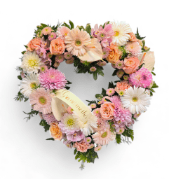 Delicate Tribute Heart Wreath. An arrangement by Appleblossoms.