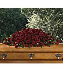 Red Rose Casket Spray. An arrangement by Hillcrest Florist.