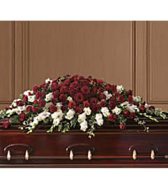 Garden Grandeur Casket Spray. An arrangement by Hillcrest Florist.
