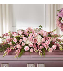 Life and Remembrance Casket Spray. An arrangement by Hillcrest Florist.