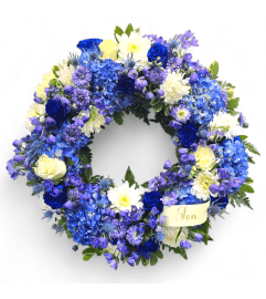 Blue Eternity Wreath. An arrangement by Appleblossoms.
