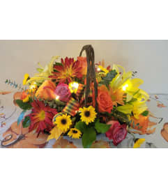 BOUNTY OF LIGHT BOUQUET. An arrangement by A Loving Touch Florist.