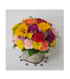 Full Color Passion. An arrangement by Aventura Blooming Petals.