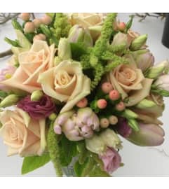 Peach Blossom Dreams. An arrangement by Plaza Florist and Gifts.
