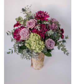 Whimsical Woodland. An arrangement by Edna Miller Flowers and Gifts Inc..