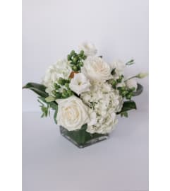 Serene Blooms. An arrangement by Edna Miller Flowers and Gifts Inc..