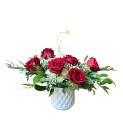 The Kiss. An arrangement by Vanessa's Flower Shop.
