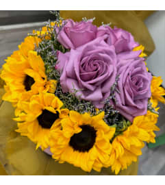 Golden Sun and Lavender Love. An arrangement by Lake Eola Florist.