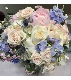 Dreamy Garden Whispers Bridal Bouquet. An arrangement by Floral Lady Design Studio LLC.